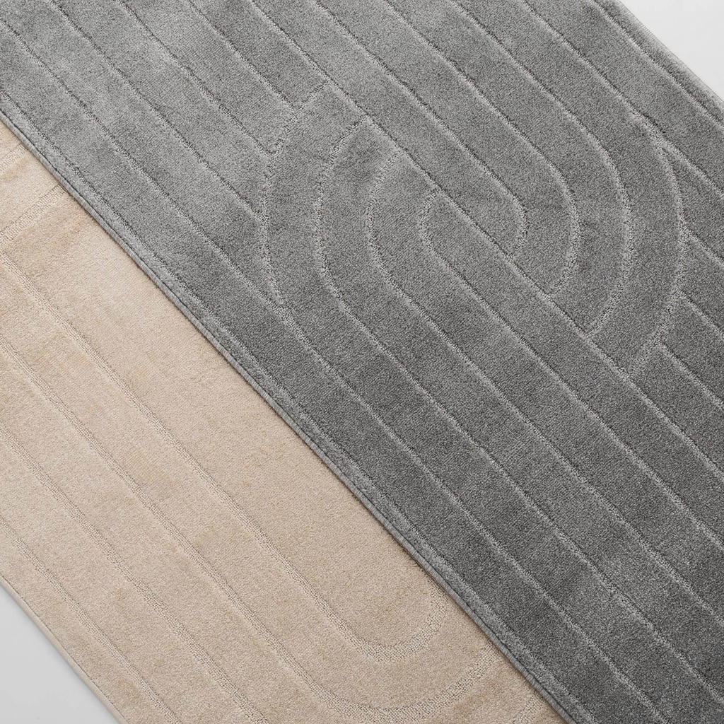Dywan szary PAULA 120x170 cm wykonany z przędzy polipropylenowej.