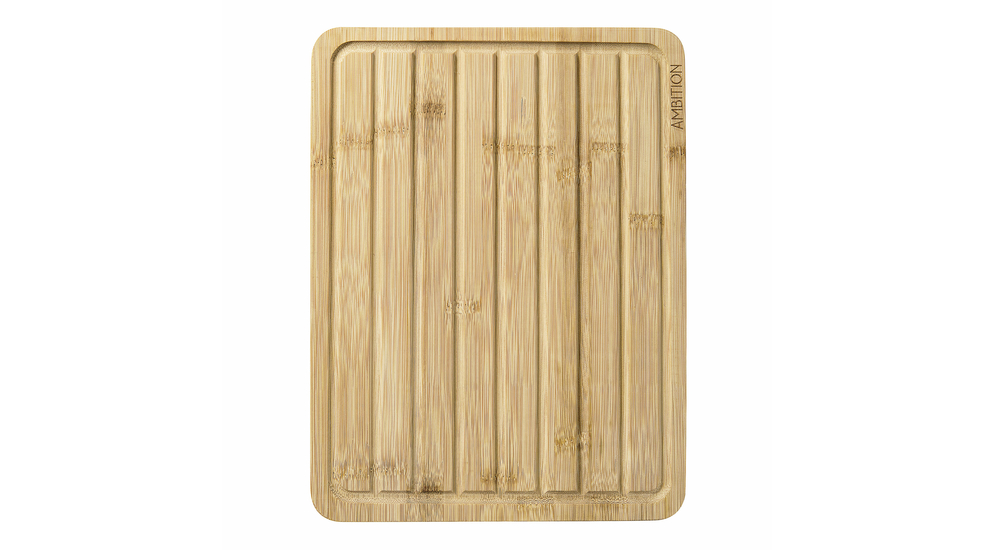 Deska do krojenia wykonana z naturalnego materiału jakim jest bambus.Jasne drewno i żłobienia sprawiają, że staje się ciekawym dodatkiem kuchni. 