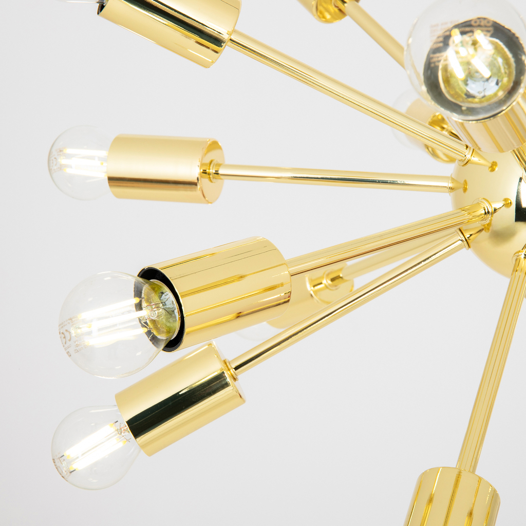 Lampa wisząca MANDI w kolorze złota posiada oprawę na 18 żarówek typu E27 o mocy maksymalnej 40W.