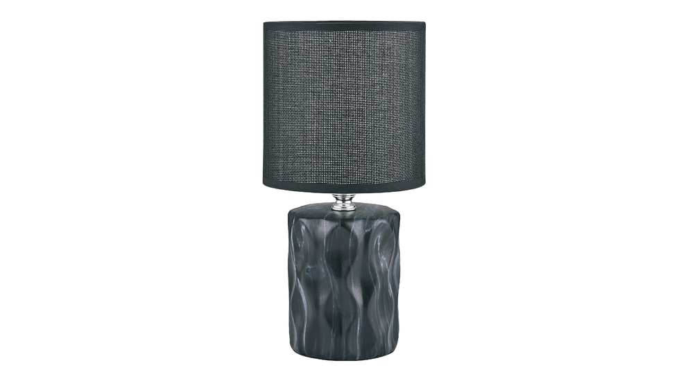 Ceramiczna lampa stołowa z falistym wzorem na podstawie.