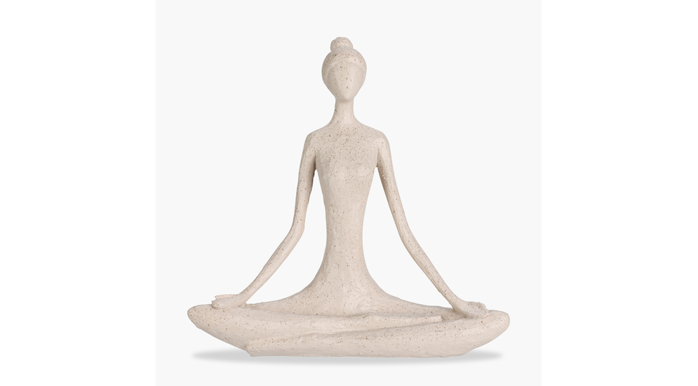 Beżowa figurka siedzącej joginki