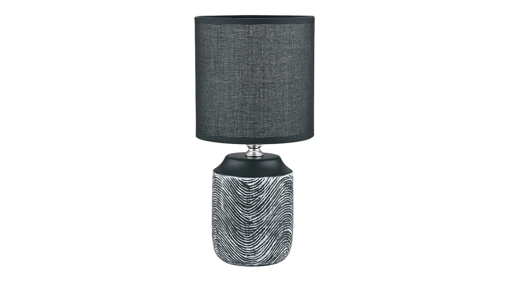Ceramiczna lampa stołowa, czarna z falistym wzorem.