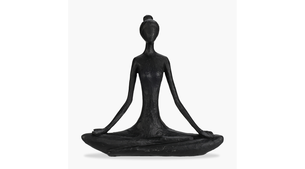 Czarna figurka siedzącej joginki